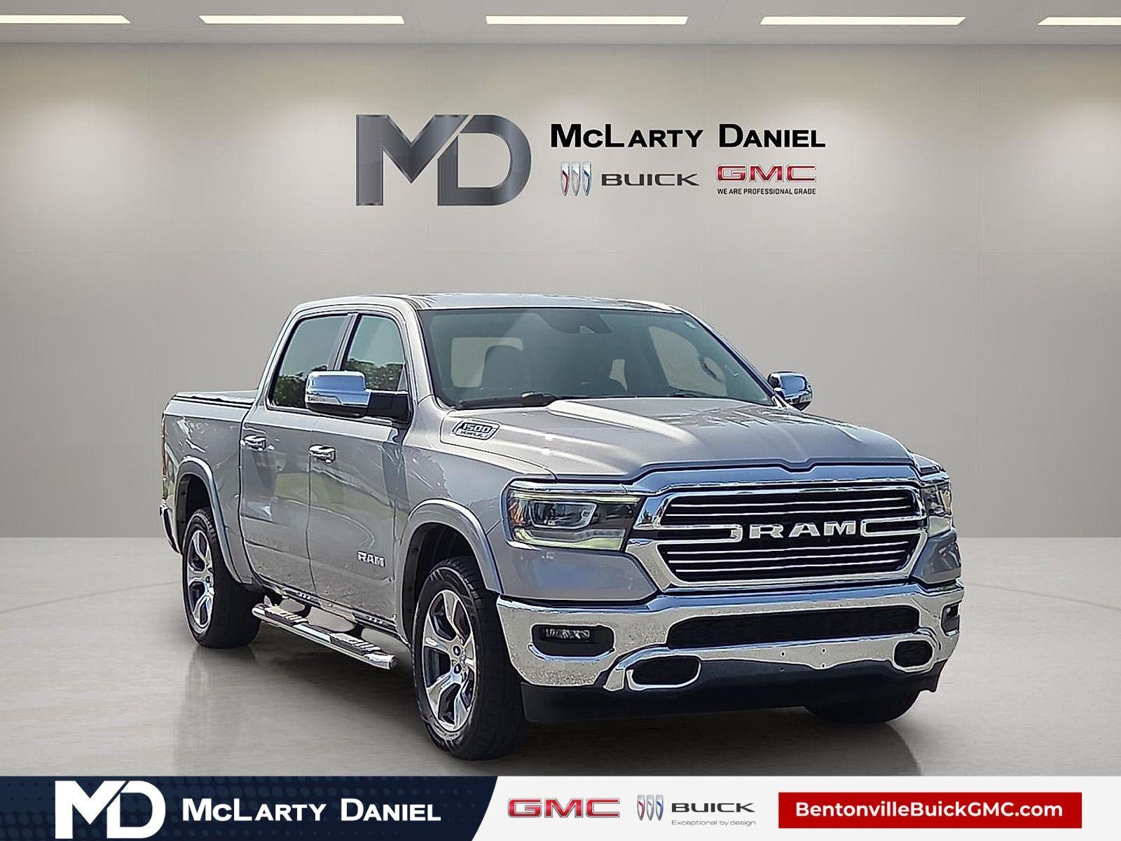 2021 RAM 1500 Laramie Crew Cab 4x4 5'7" Box in Silver — front three-quarter view