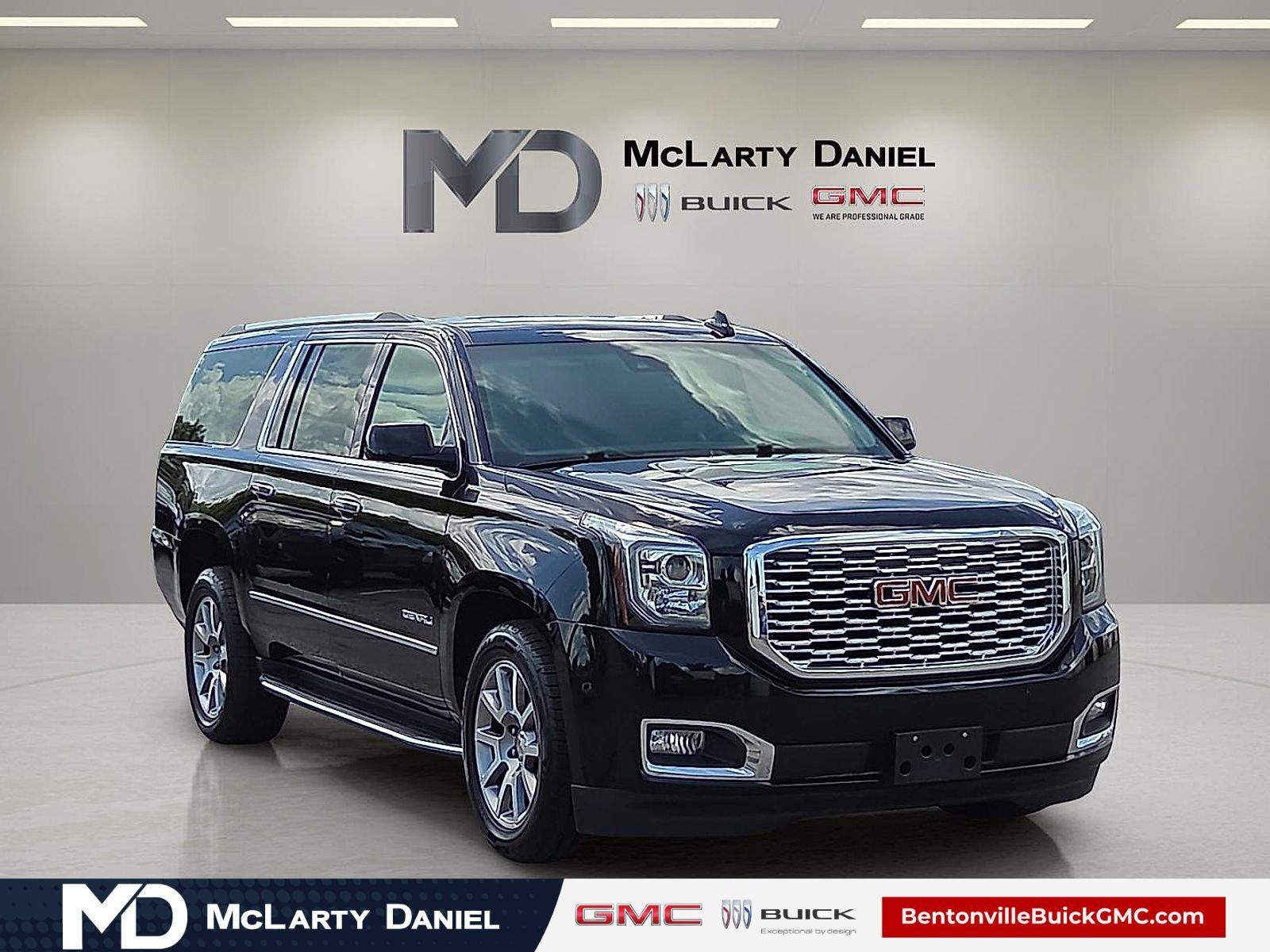 2019 GMC Yukon XL Denali in Onyx Black — front three-quarter view