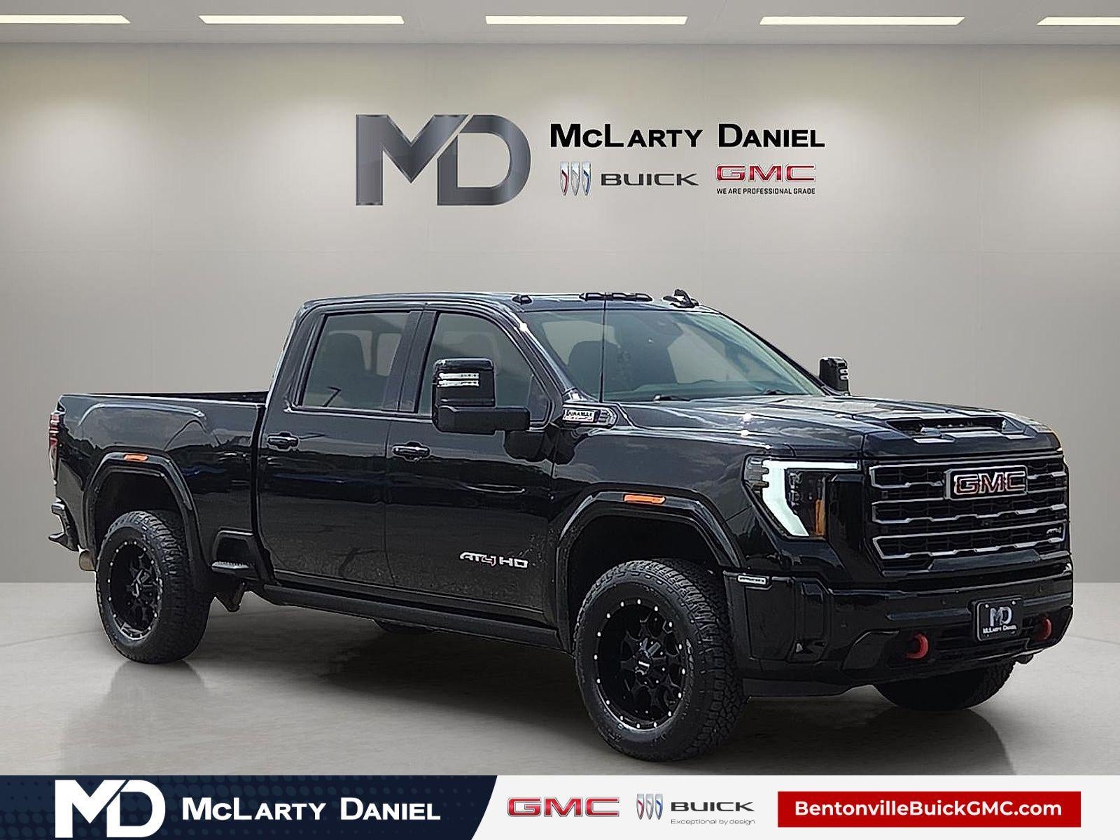 2025 GMC Sierra 2500 HD AT4 in Onyx Black — front three-quarter view