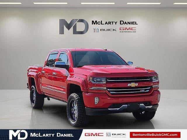 2018 Chevrolet Silverado 1500 LTZ in Red Hot — front three-quarter view