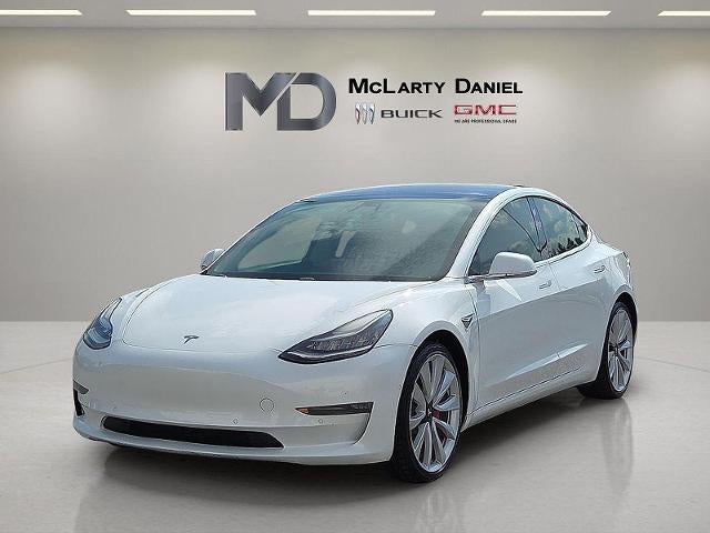 2018 Tesla Model 3 — rear three-quarter view