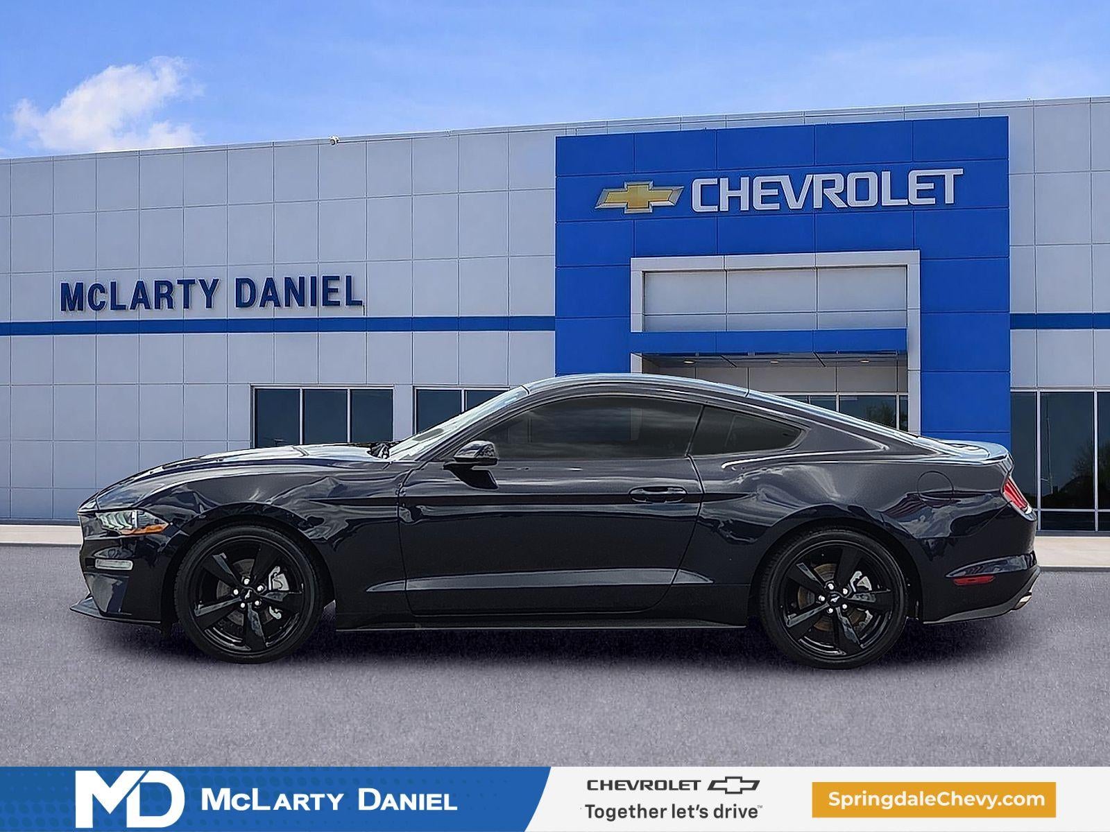 2021 Ford Mustang — rear three-quarter view