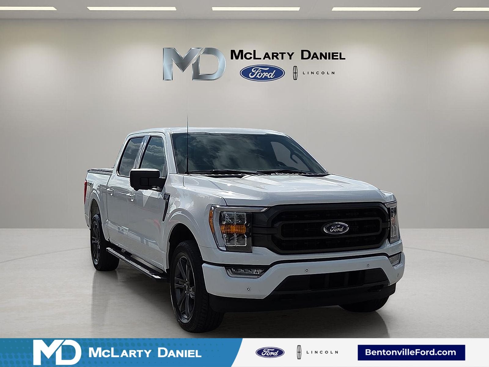 2023 Ford F-150 XLT in Oxford White — front three-quarter view