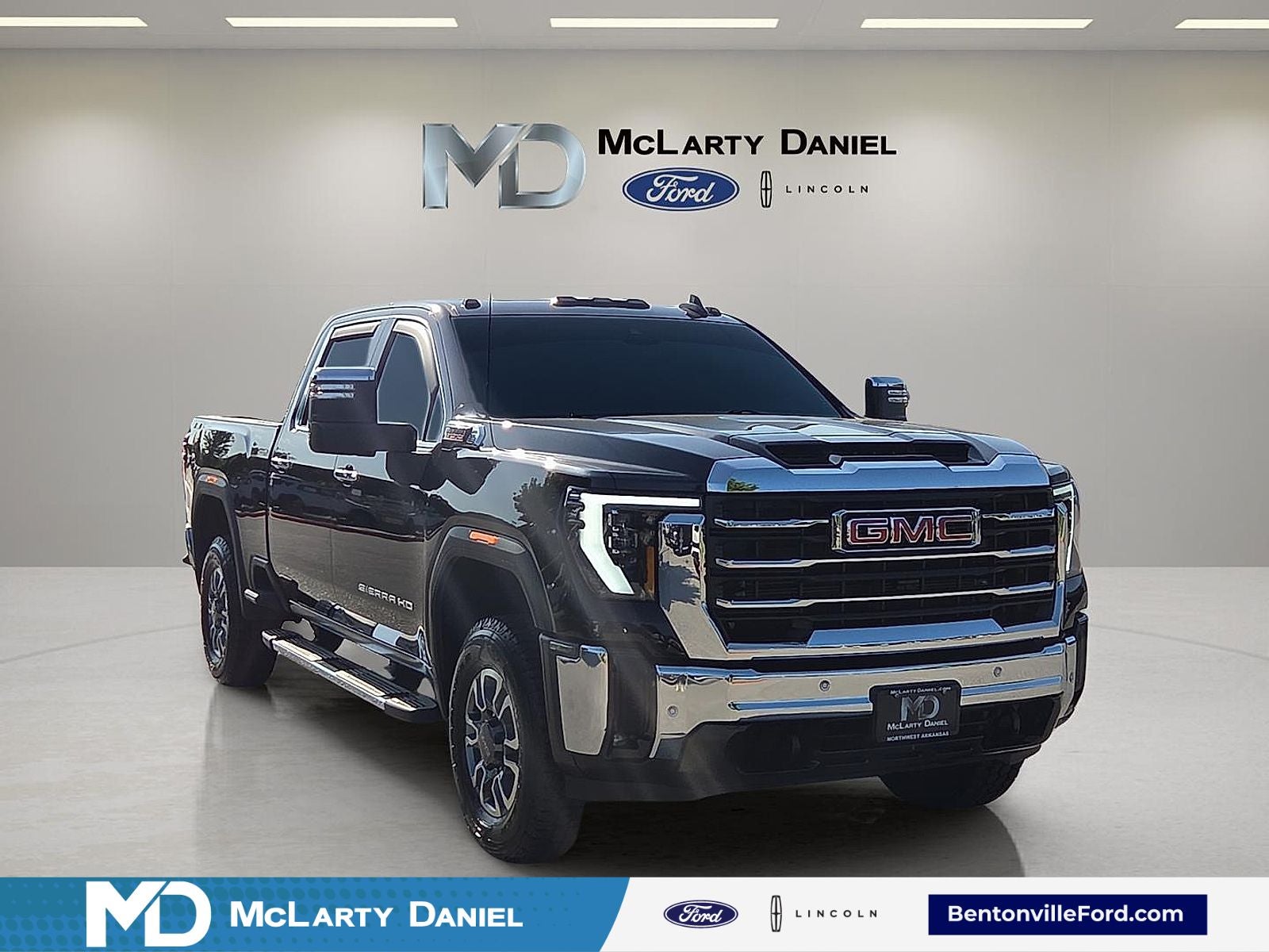2024 GMC Sierra 2500HD SLT in Onyx Black — front three-quarter view