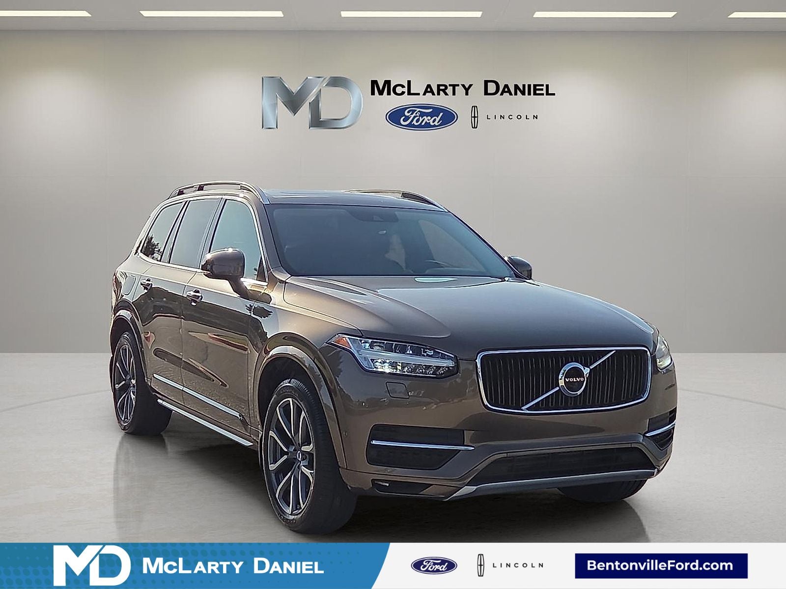 2016 Volvo XC90 T6 Momentum in Twilight Bronze Metallic — front three-quarter view