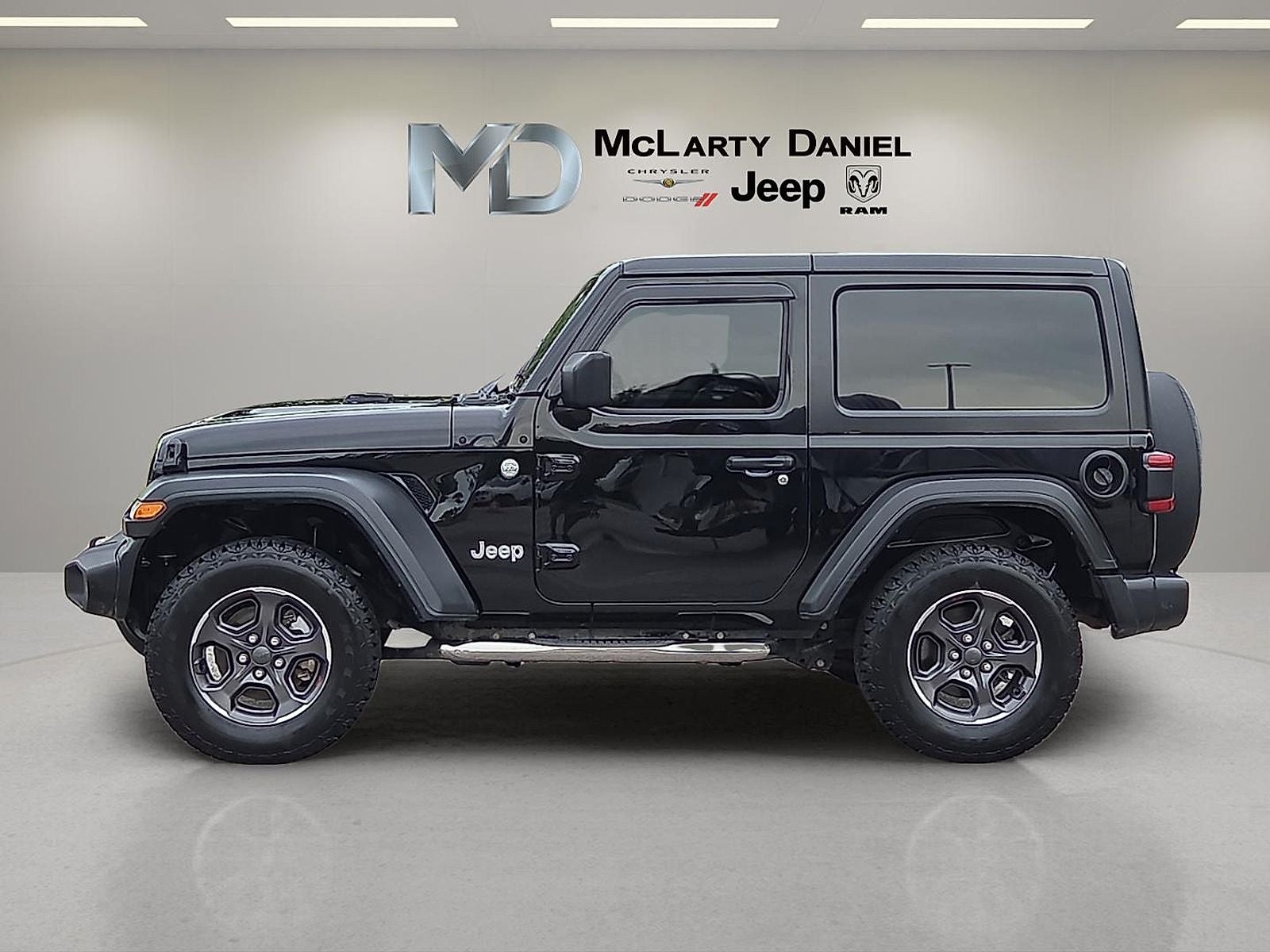 2019 Jeep Wrangler — rear three-quarter view