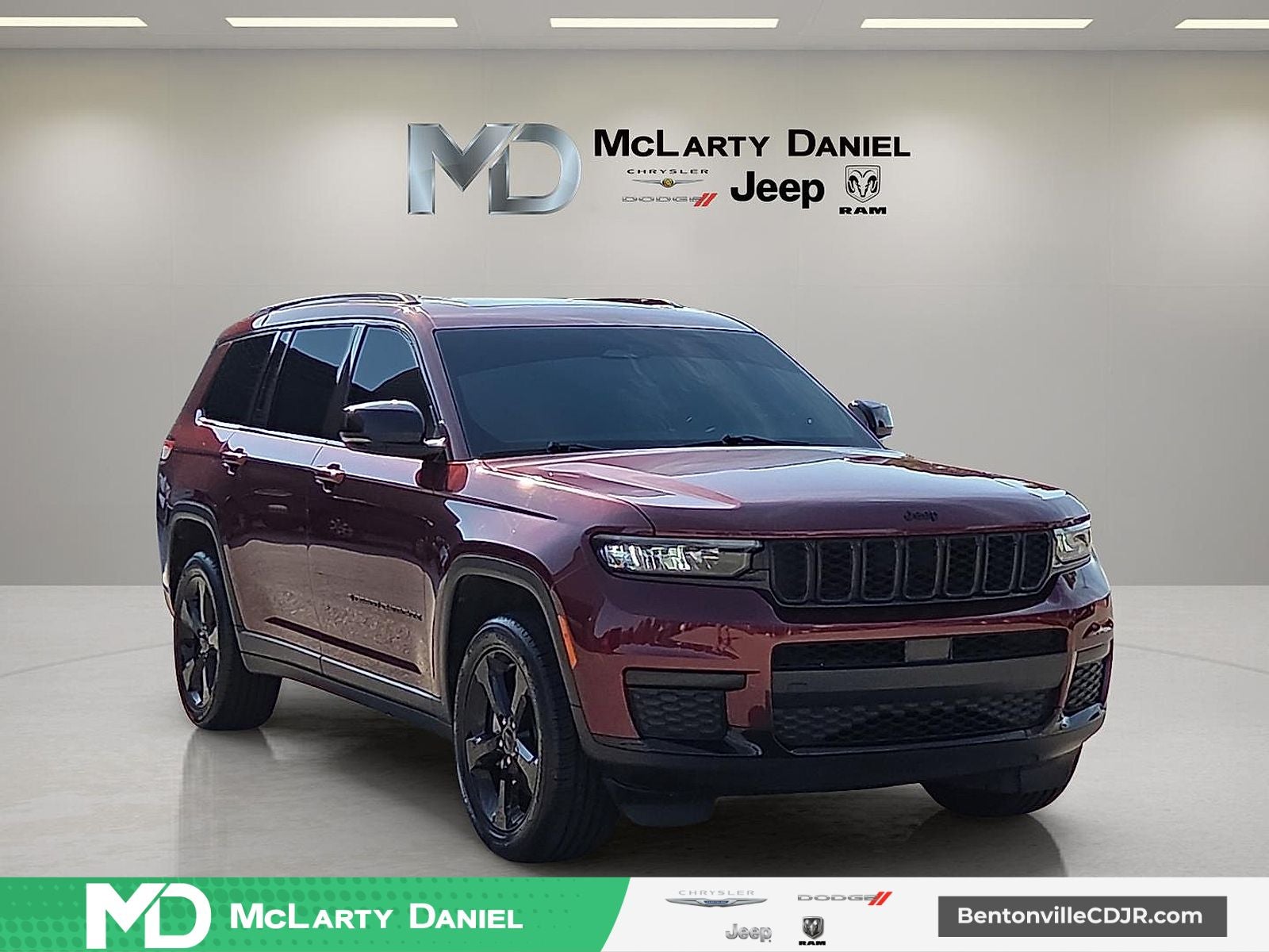 2023 Jeep Grand Cherokee L Altitude 4x4 in Velvet Red Pearlcoat — front three-quarter view