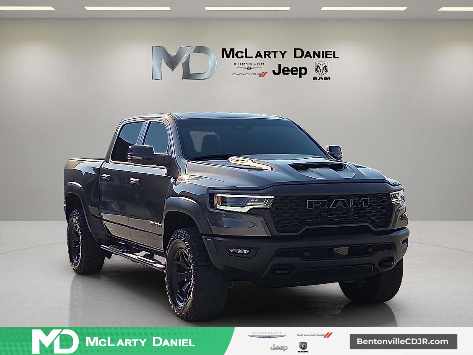 2025 RAM 1500 RHO Crew Cab 4x4 5'7' Box in Granite Crystal Met Cc — front three-quarter view