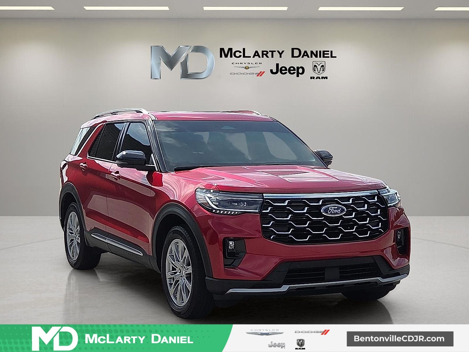 2025 Ford Explorer Platinum in Rapid Red Metallic Tinted Clearcoat — front three-quarter view