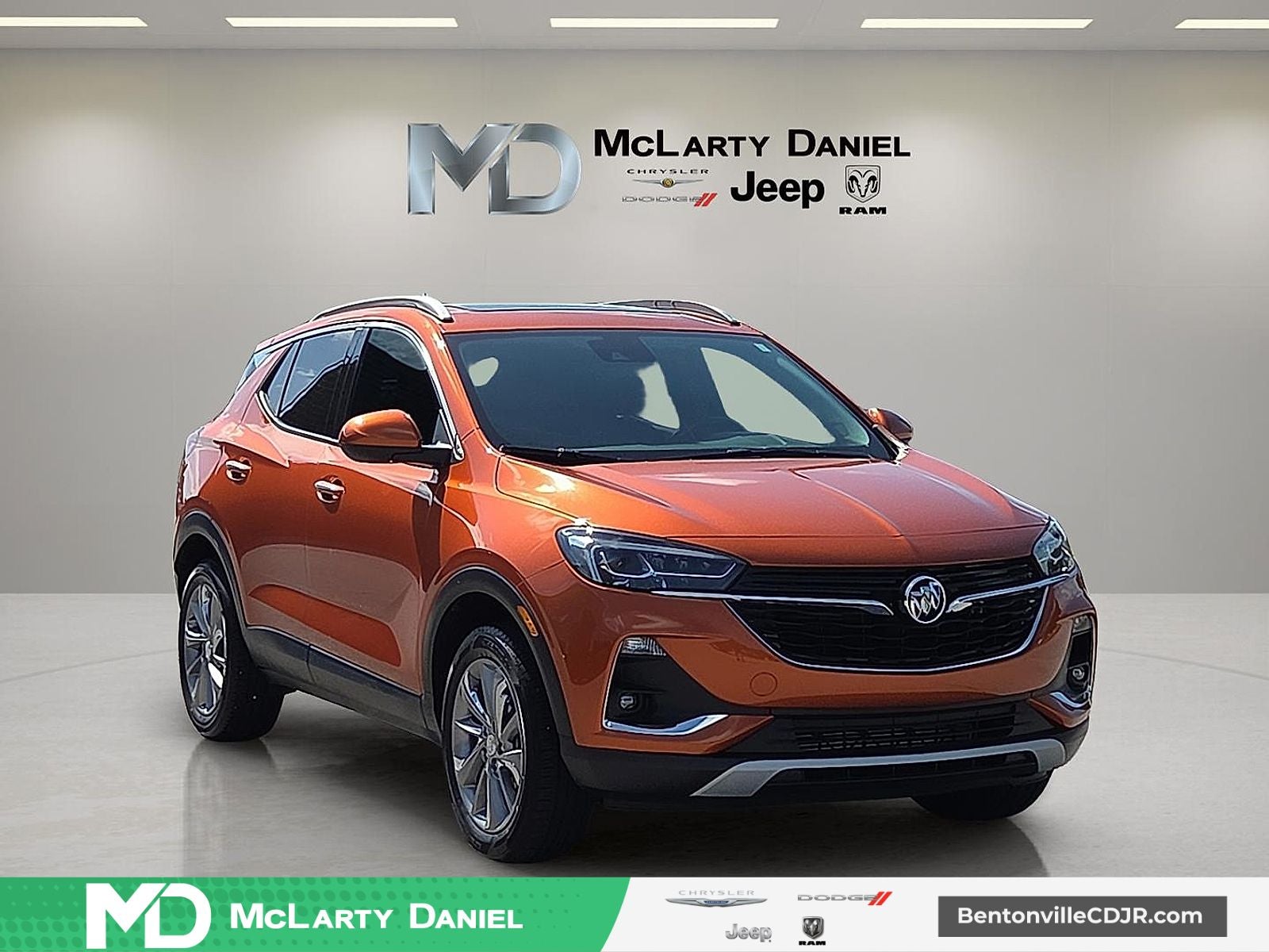 2023 Buick Encore GX Essence AWD in Sunset Glow Metallic — front three-quarter view