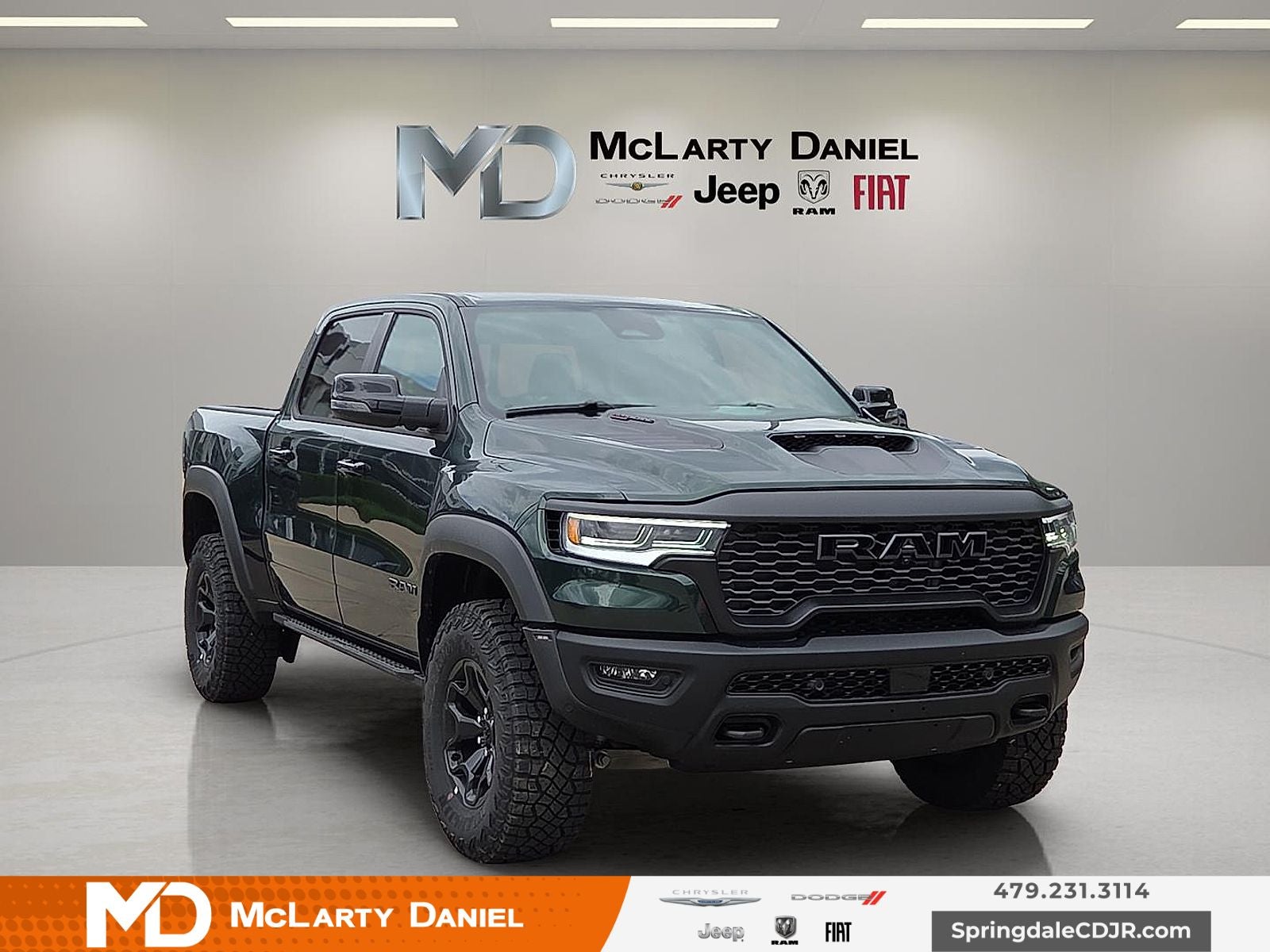 2026 RAM Ram 1500 RAM 1500 RHO CREW CAB 4X4 5'7' BOX in Serrano-Green Metallic Exterior Paint — front three-quarter view