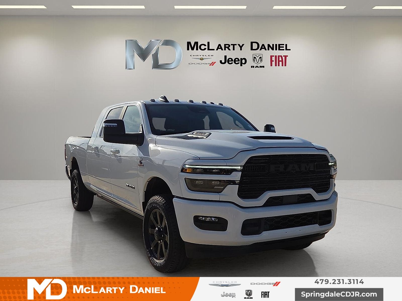 2026 RAM Ram 2500 RAM 2500 LARAMIE MEGA CAB 4X4 6'4' BOX in Bright White Clear-Coat Exterior Paint — front three-quarter view