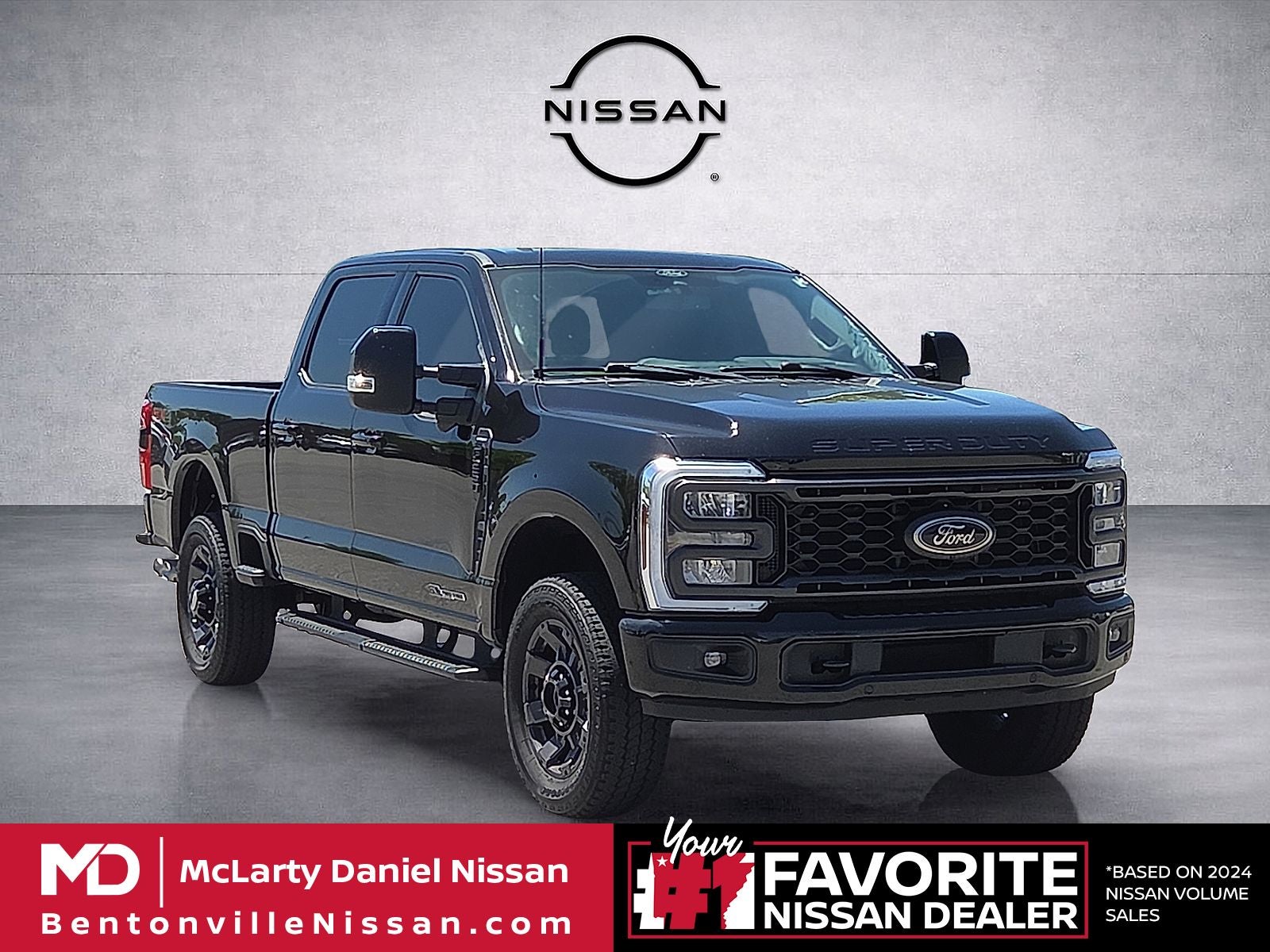 2024 Ford F-250SD Lariat in Black Metallic — front three-quarter view