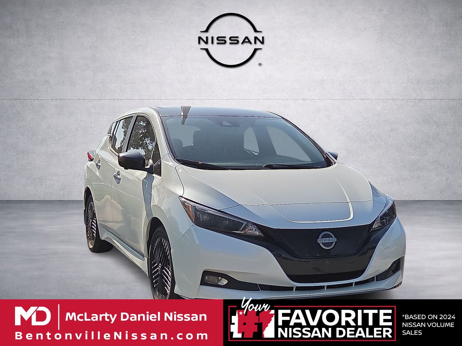 2023 Nissan Leaf SV Plus in Super Black/Pearl White — front three-quarter view