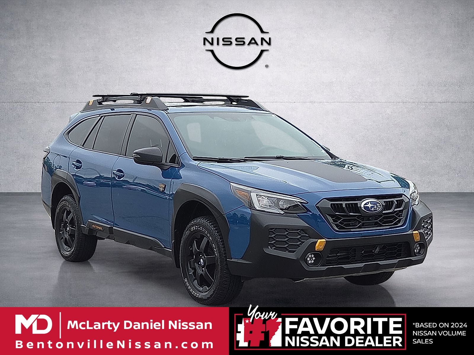 2025 Subaru Outback Wilderness in Geyser Blue — front three-quarter view